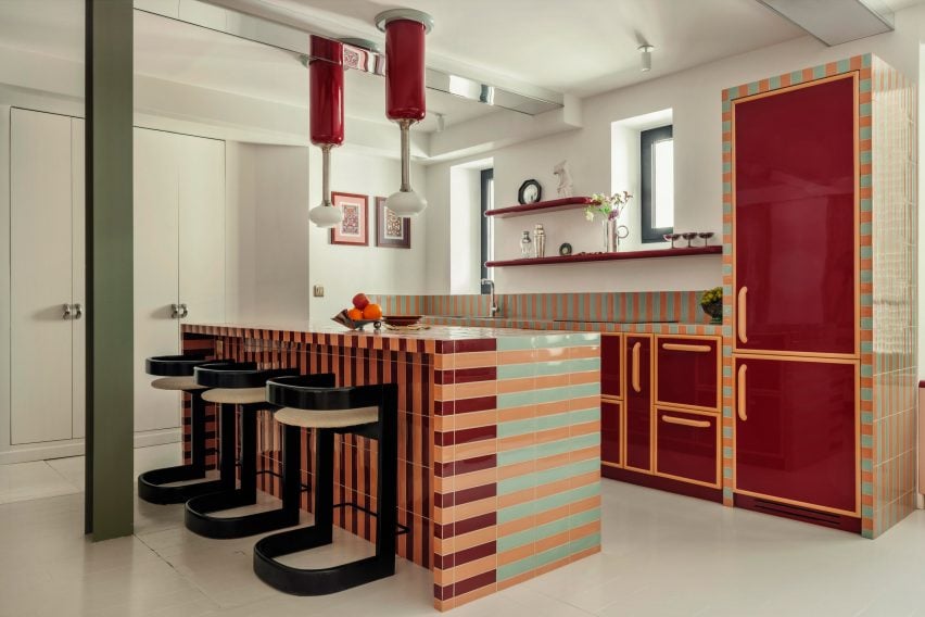 Kitchen with striped, tiled island and counters