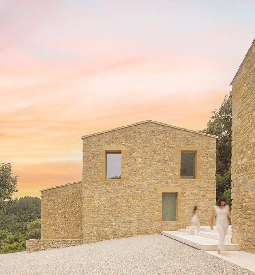 fran silvestre restores limestone farmhouse in spain as off-grid home and workspace